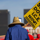 A man calls for the shutdown of the U.S. Immigration and Customs Enforcement agency during a march May 1, 2019, in Los Angeles. ICE authorities are expected to conduct a major crackdown on immigrants in Los Angeles and in major cities across the nation, beginning Sunday, June 23, 2019.